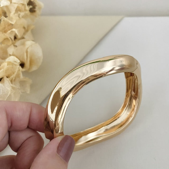 Bracelete Ondas Dourado Aço Inox