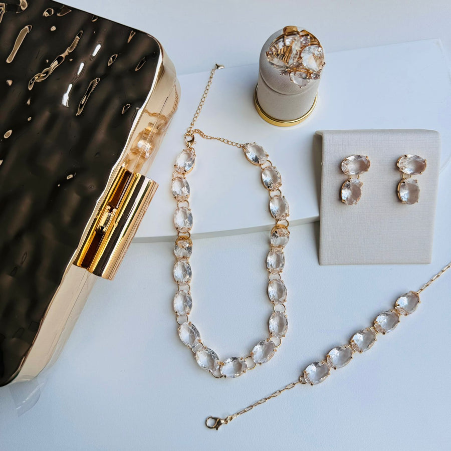 Kit Clutch, Anel, Brinco, Pulseira e Colar Oval em Zirconia Fúcsia Doria