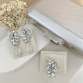 Kit Clutch, Brinco e Anel Regulável Londres Cristal Prata