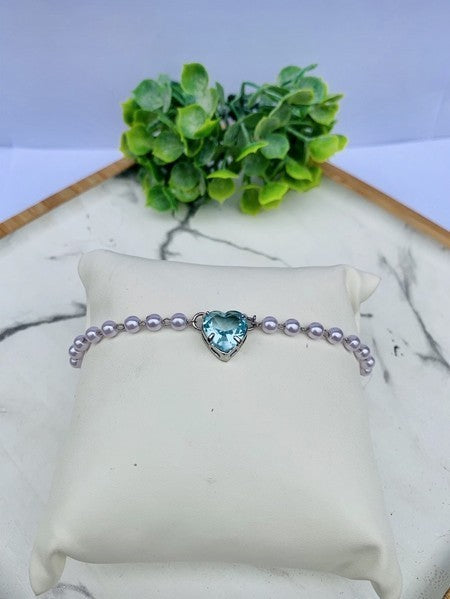 Pulseira de pérola com coração