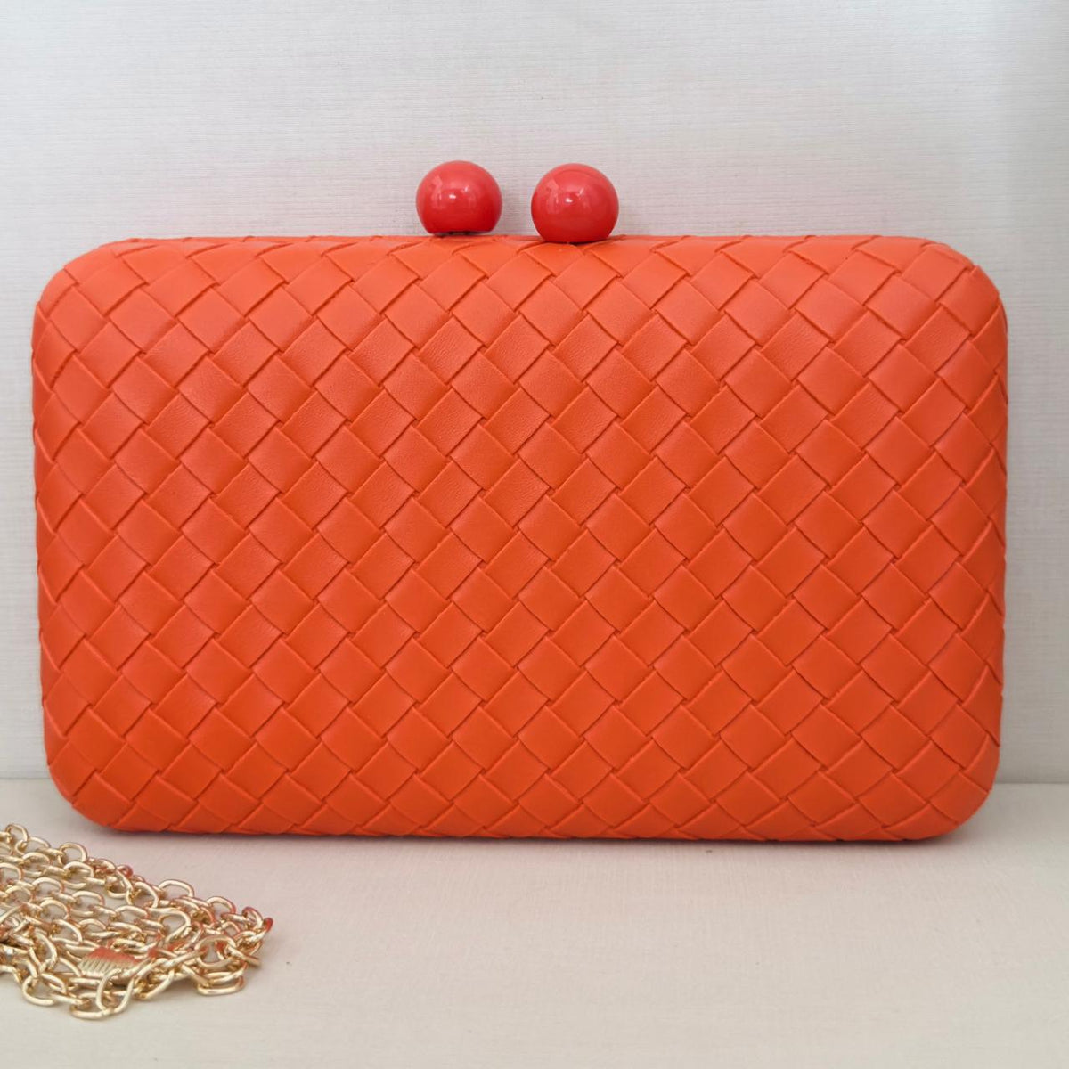 Clutch Detalhada Laranja Coral