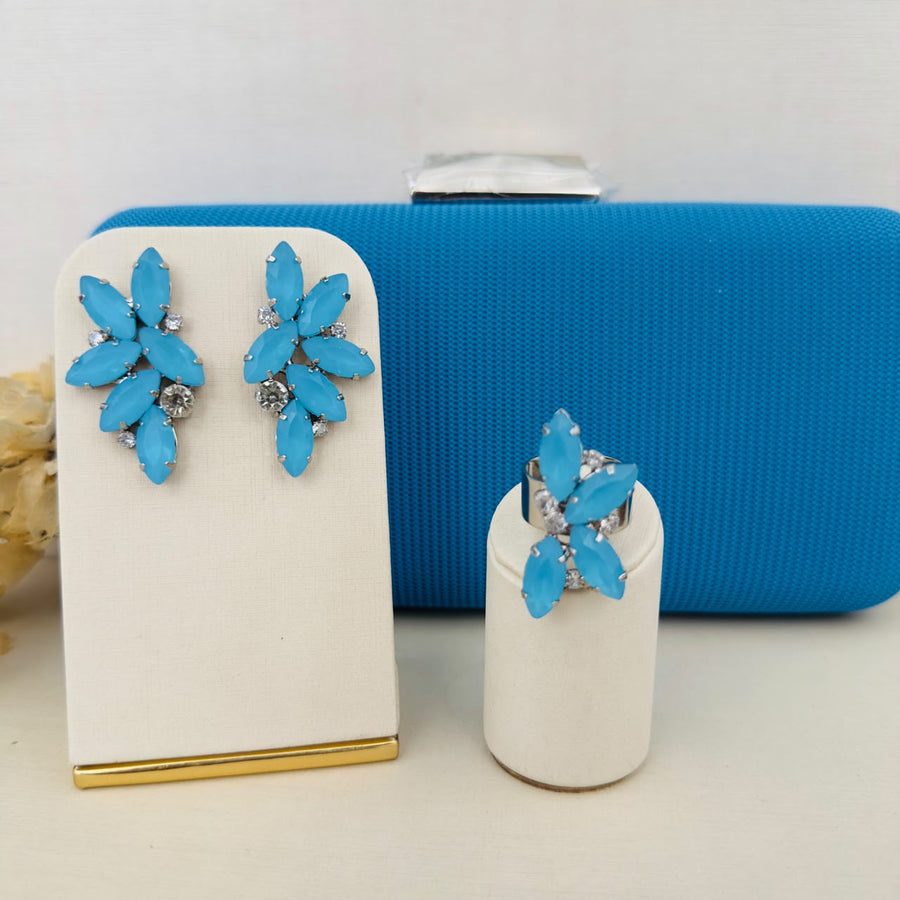 Kit Clutch, Brinco e Anel Regulável Noronha de Pedraria Azul Claro Banho Prata
