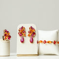 Kit Brinco, Bracelete e Anel Regulável Josy Coral com Rosa Fúcsia Banho Dourado