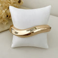 Bracelete Ondas Dourado Aço Inox