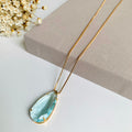 Colar Gota Palito de Zircônia Cor.:Azul claro;Banho:Dourado