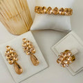 Kit Brinco, Anel Regulavel e Bracelete Lunna de Zirconia Nude Dourado