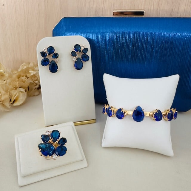 Kit Clutch, Brinco e Anel Regulável The Bronx em Zircônia Azul Safira Dourado